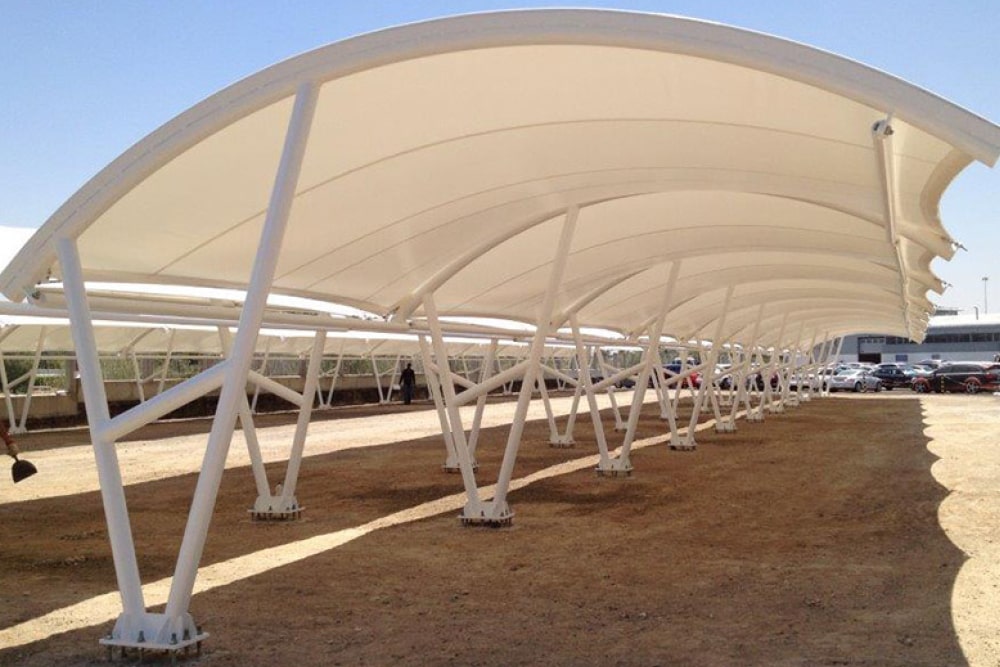 Cubiertas de medio cañon para estacionamientos>
<p class=